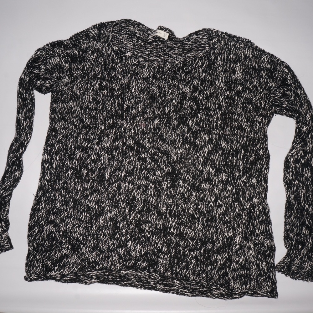 white and black sweater